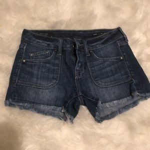 William Rast dark jean cut-off shorts; size 25.